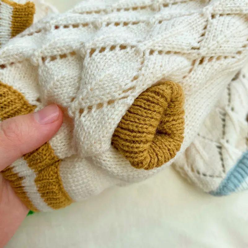 Hollow-out knitted dog sweater by Pet Zen, cream with brown cuffs