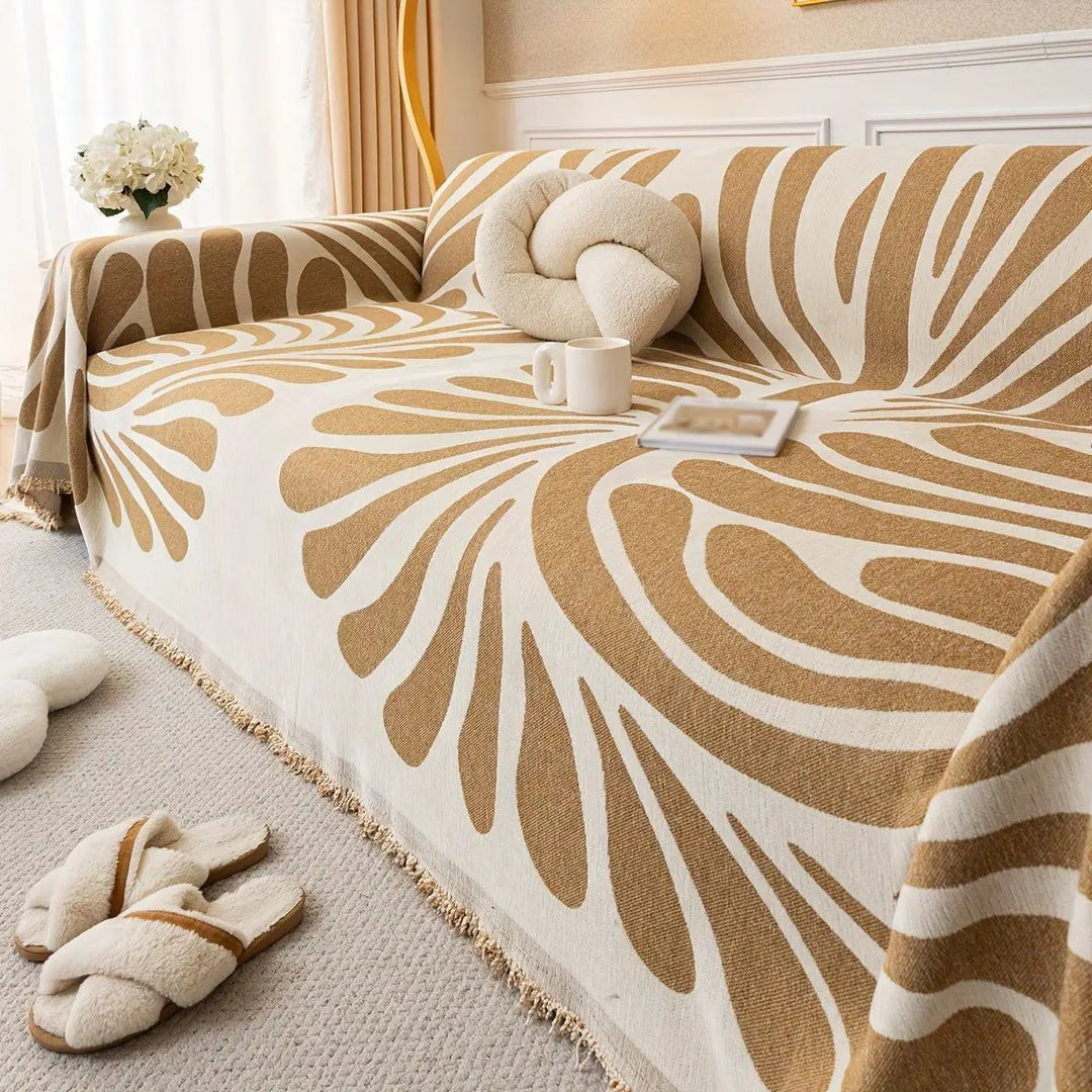 Versatile chenille sofa cover in orange and cream; pet-friendly by topspet