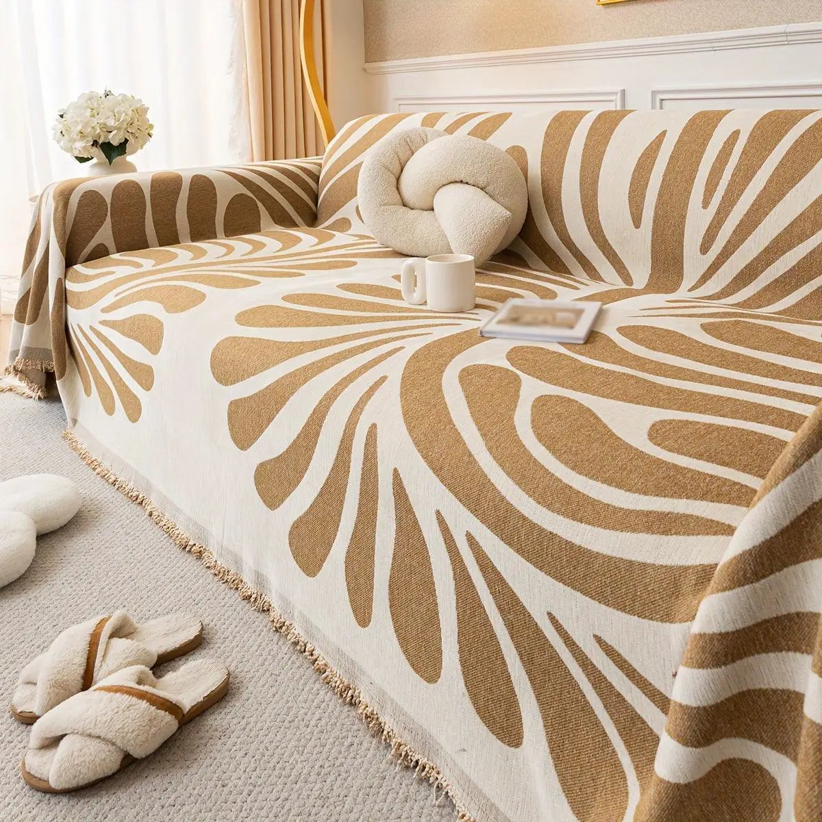 Versatile chenille sofa cover in orange and cream; pet-friendly by topspet