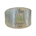 Carica l'immagine nel visualizzatore della galleria, Silver snake-skin cuff bracelet with iridescent Swarovski crystal rivet centerpiece.
