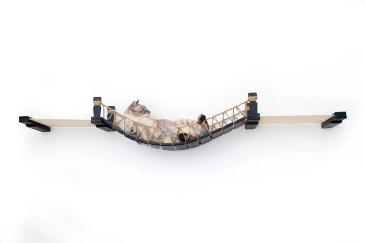 Double Cat Hammock and Climbing Bridge Combo; cat bridge in natural wood with rope net, one cat resting.