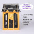 Load image into Gallery viewer, Spooky Cat Haunted House cardboard cat condo; orange box with black windows and a striped black roof.
