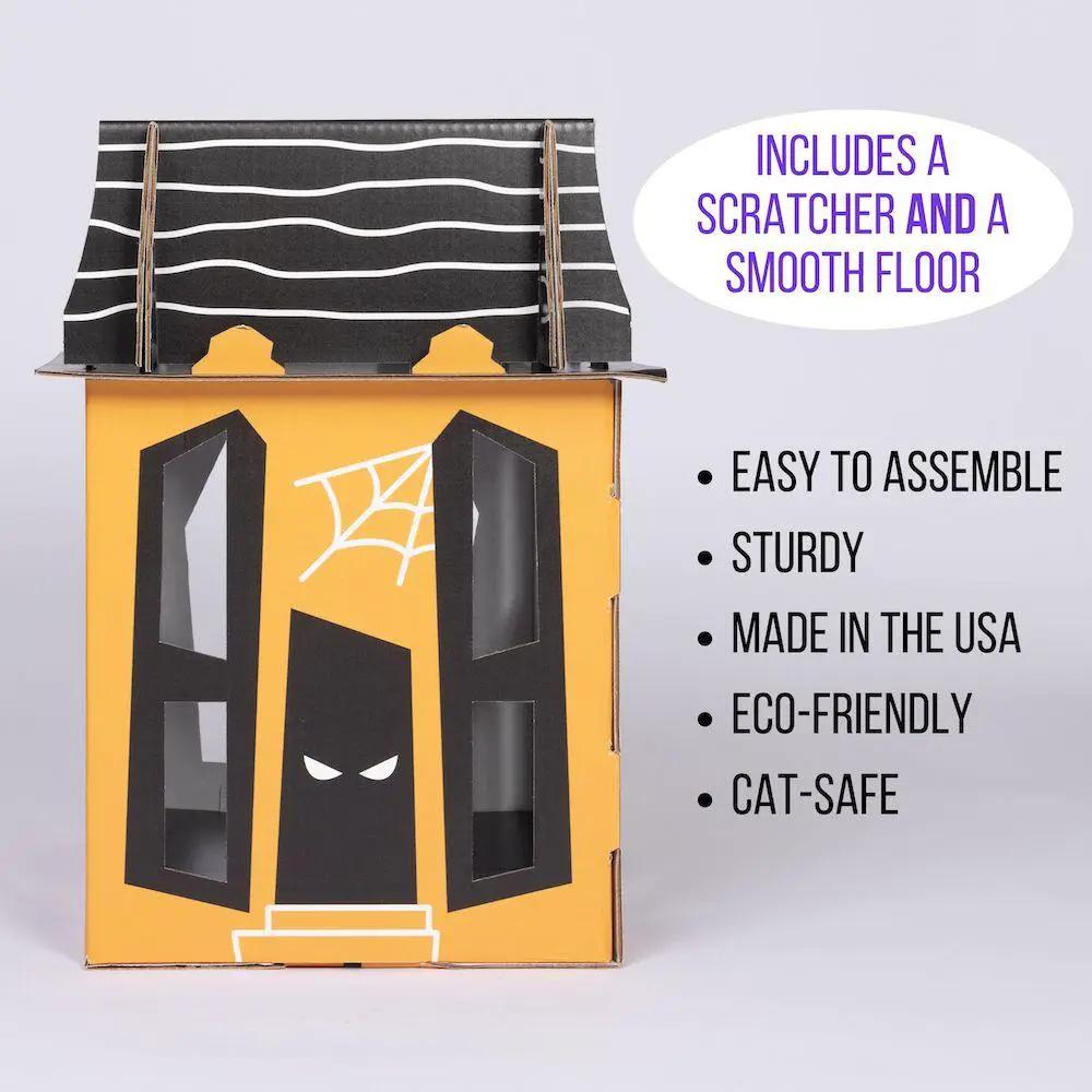 Spooky Cat Haunted House cardboard cat condo; orange box with black windows and a striped black roof.