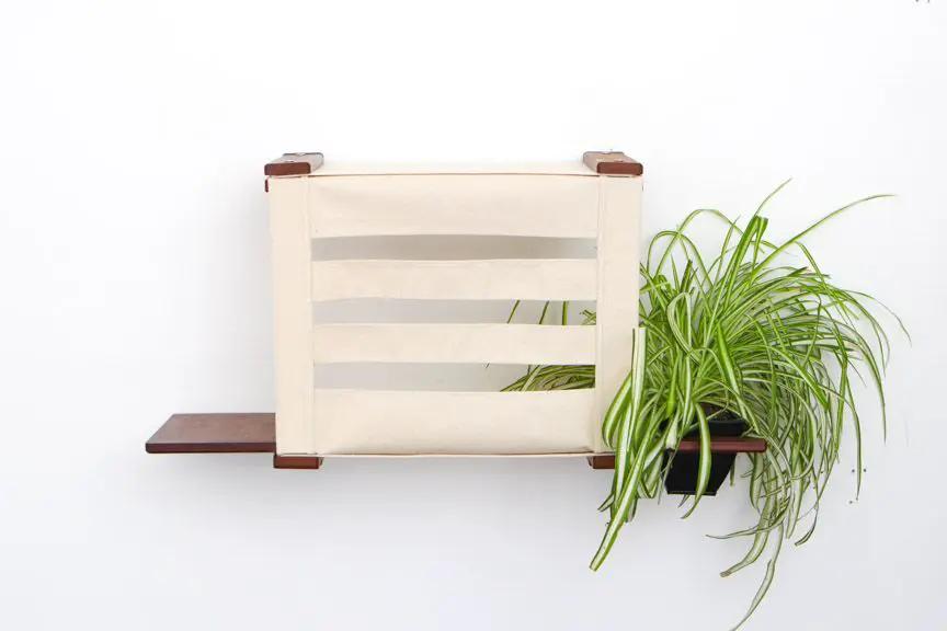 Deluxe Cat Cubby Bed cat condo in beige fabric with a wooden frame