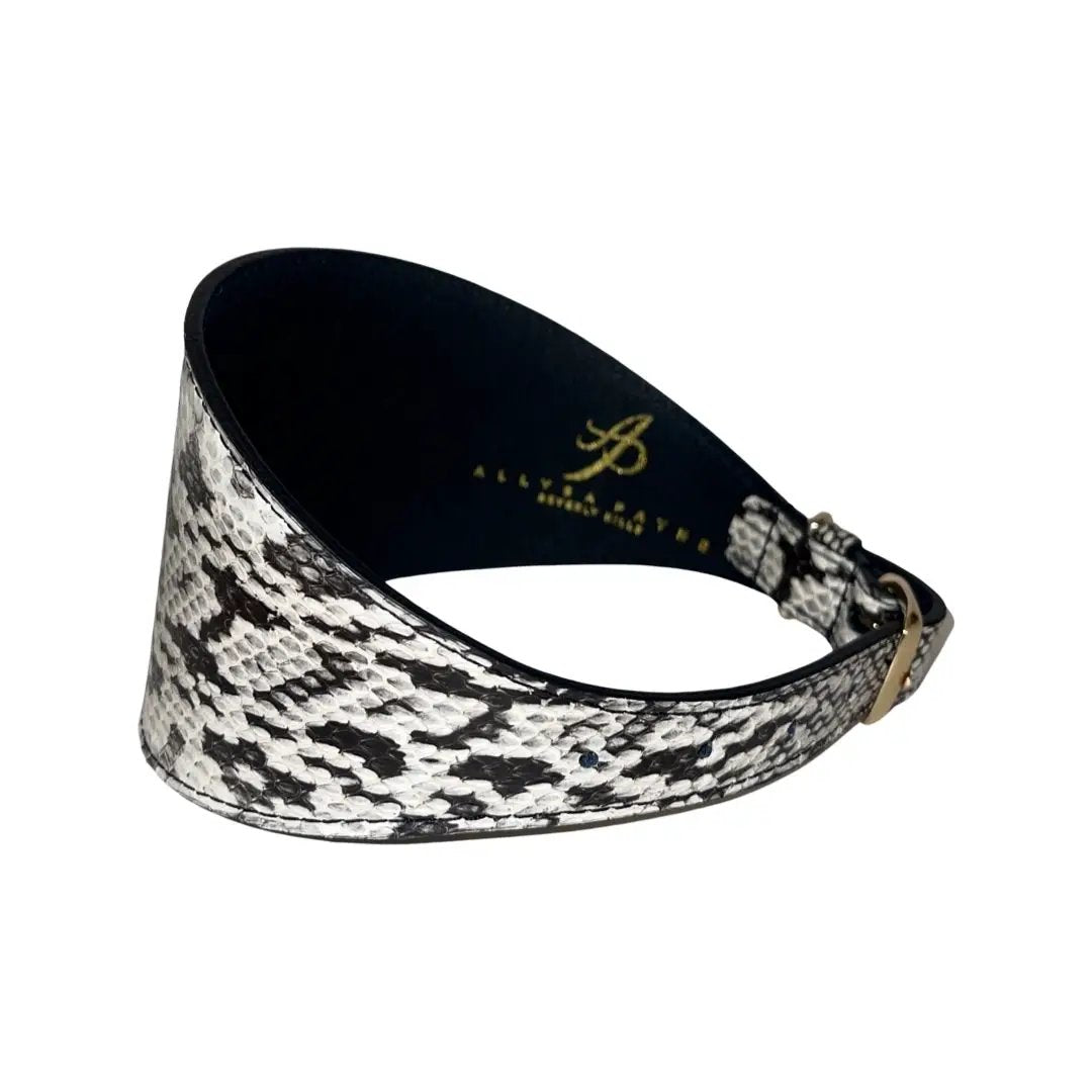 Collar: white and black snakeskin print, 4-inch wide, Allysa Payne Beverly Hills.