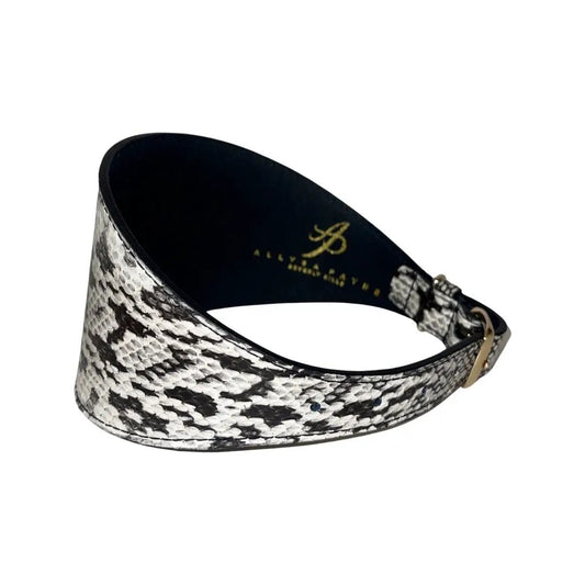 Collar: white and black snakeskin print, 4-inch wide, Allysa Payne Beverly Hills.