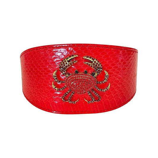 Red-orange snake-skin wide collar with rhinestone crab accessory by Allysa Payne Beverly Hills