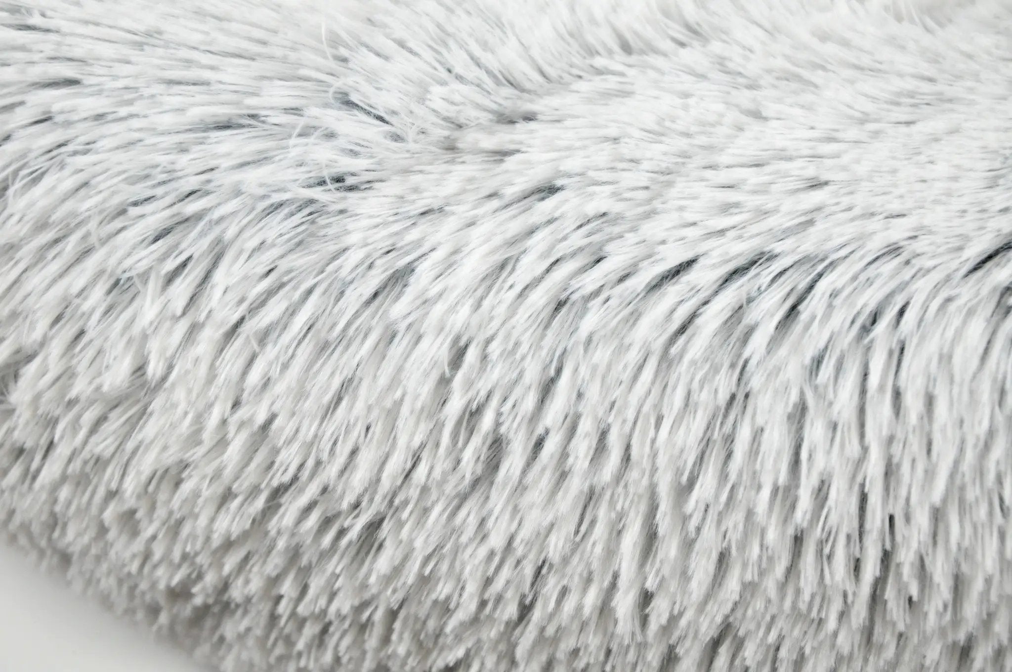 Mr. Peanut's OrthoPlush pet bed surface in snowflake white two-tone plush fur