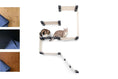 Carica l'immagine nel visualizzatore della galleria, The Deluxe Cat Fort - Modern Cat Condo with beige fabric straps on a light wood frame with two cats.
