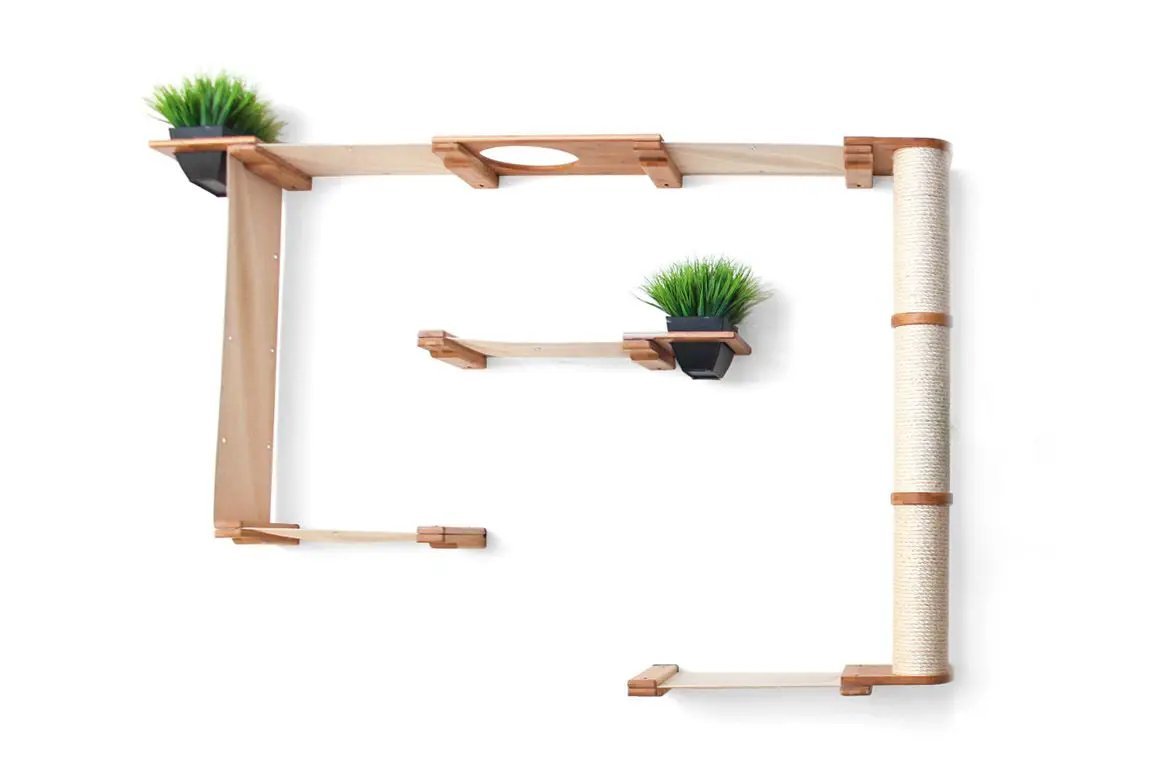 The Gardens cat condo; wooden cat tree with green plants and a sisal-wrapped post.