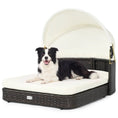 Load image into Gallery viewer, Rattan pet daybed with adjustable white canopy and white cushion on a dark brown wicker base
