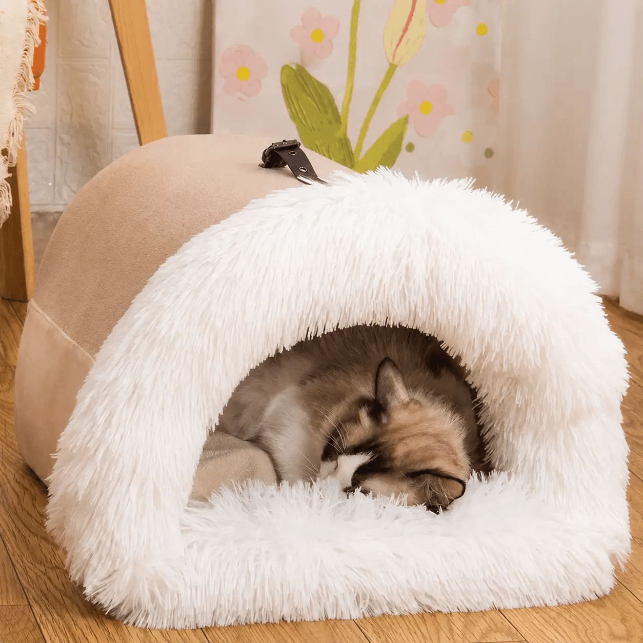 Cozy Haven Plush Pet House cave-style bed in beige with a white fluffy rim; cat sleeping inside.