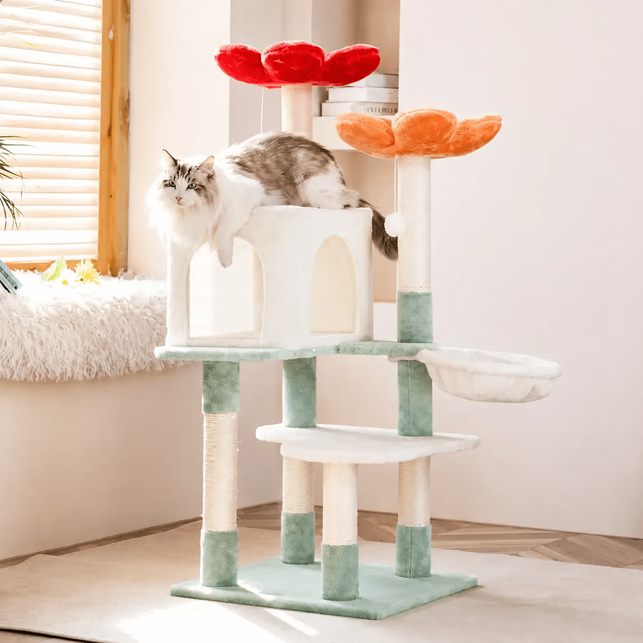 The Wildflower Cat Tower cat tree in cream and pastel green plush with two flower-top perches