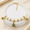 Charger l'image dans la visionneuse de la galerie, The Pearl & Crystal Pet Necklace with white pearl beads, gold-tone accents, and a festive Christmas tree charm
