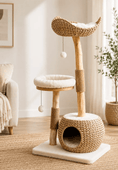 Gallery viewerに画像を読み込む, The Natural Haven Modern Cat Tree in natural wicker with white plush cushions and rope-wrapped posts.
