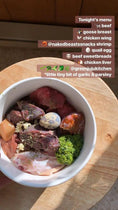 Load image into Gallery viewer, Shrimp in a white bowl with assorted raw meats, garlic and parsley, Naked Beasts
