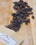 Load image into Gallery viewer, Chicken Hearts small animal treats by Naked Beasts, dried dark brown chunks
