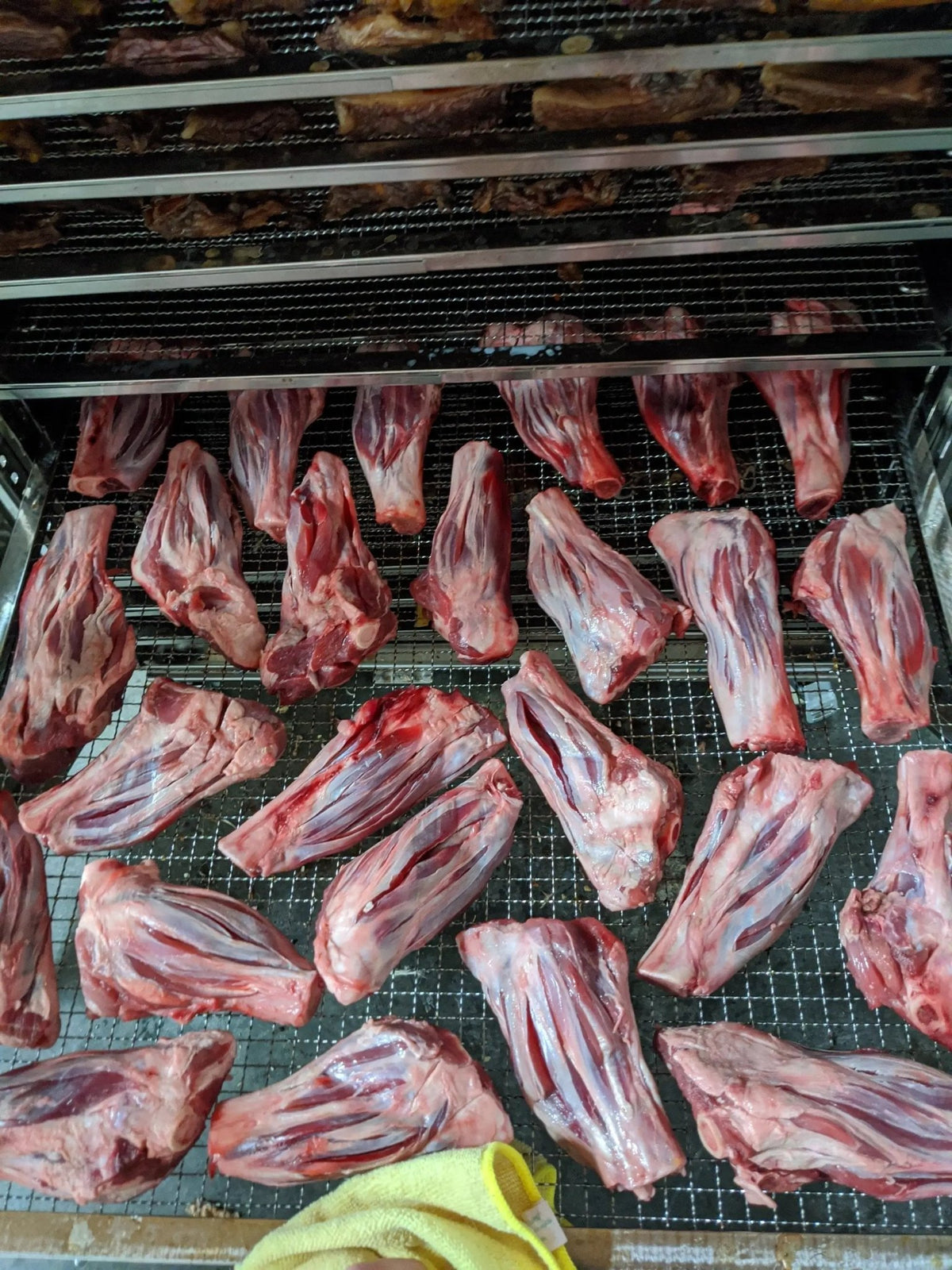 Lamb shanks, Naked Beasts pasture-raised, bone-in cuts on wire racks