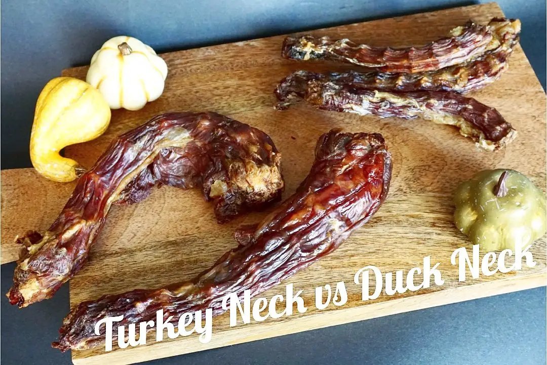 Turkey necks by Naked Beasts on a wooden board with small gourds.