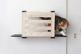 Carica l'immagine nel visualizzatore della galleria, Cat Cubby for Wall Covered Cat Bed by Catastrophic Creations; beige fabric, wall-mounted cat condo.

