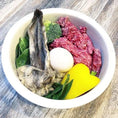 Load image into Gallery viewer, Lamb Ears (Furry & Non-Fur) by Naked Beasts; bowl includes raw meat, a white egg, broccoli, greens, and a yellow heart-shaped item
