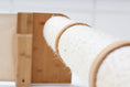 Bild in Galerie-Betrachter laden, The Gardens cat condo with beige sisal rope tubes on a wooden base.
