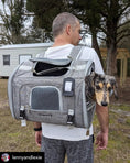 Charger l'image dans la visionneuse de la galerie, Mr. Peanut's Monterey Series airline-compliant horizontal backpack pet carrier in gray with a dog peeking out.
