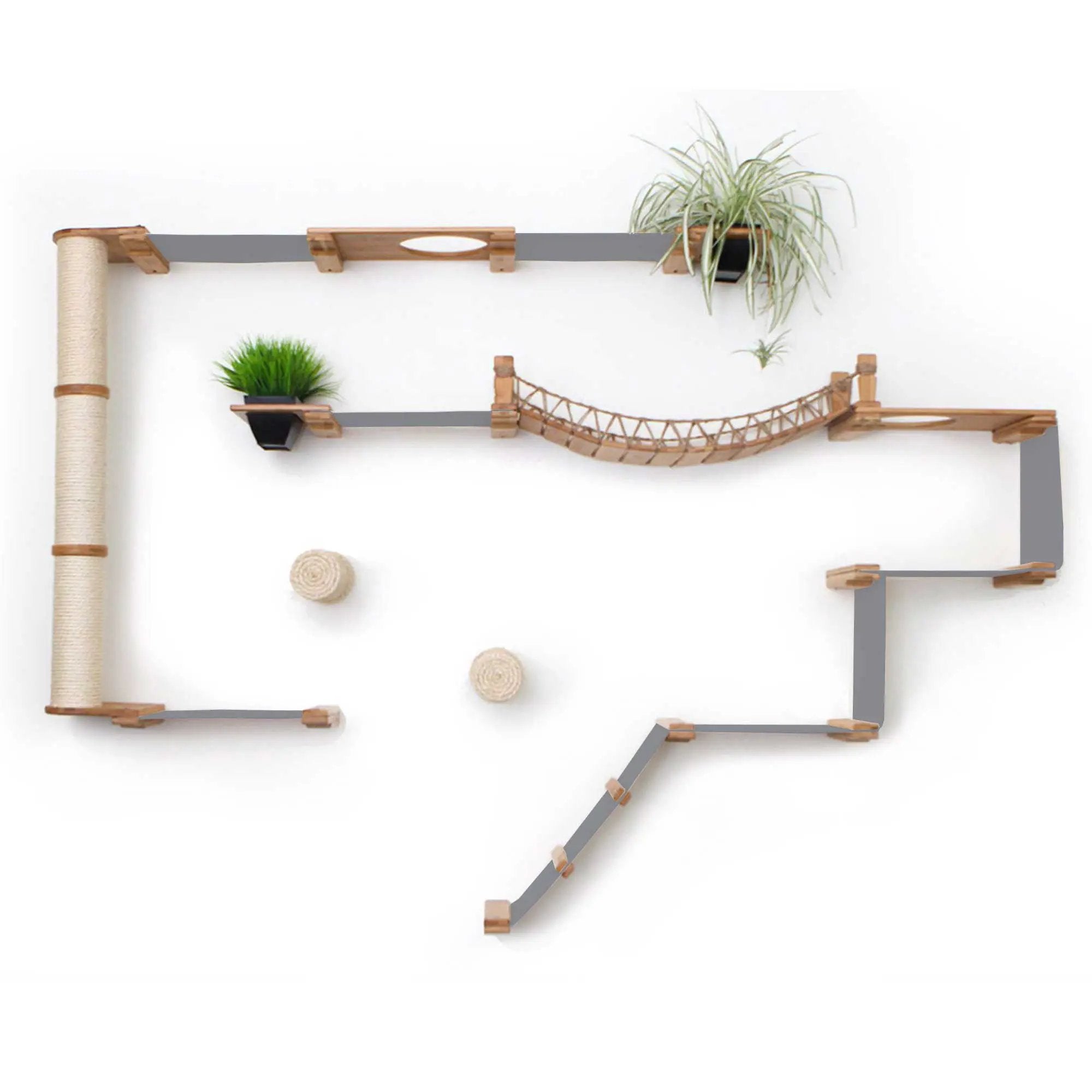 The Juggernaut indoor cat playground on wall by Catastrophic Creations; grey platforms, beige sisal post, rope bridge.