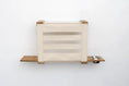 Carica l'immagine nel visualizzatore della galleria, Deluxe Cat Cubby Bed by Catastrophic Creations, beige fabric cat condo with wooden frame and side shelves.
