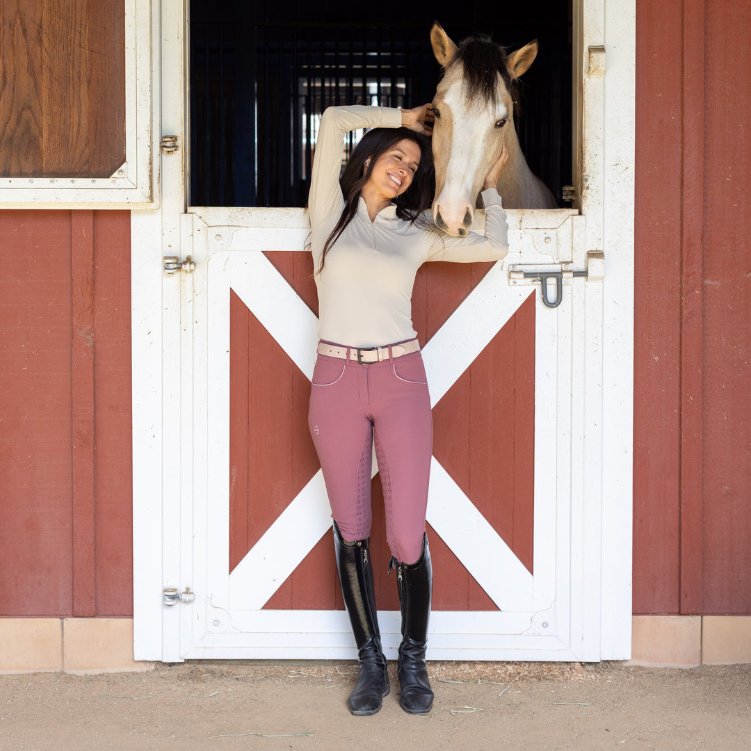 Halter Ego Rosé Lumière Leather Polo Belt worn by a rider