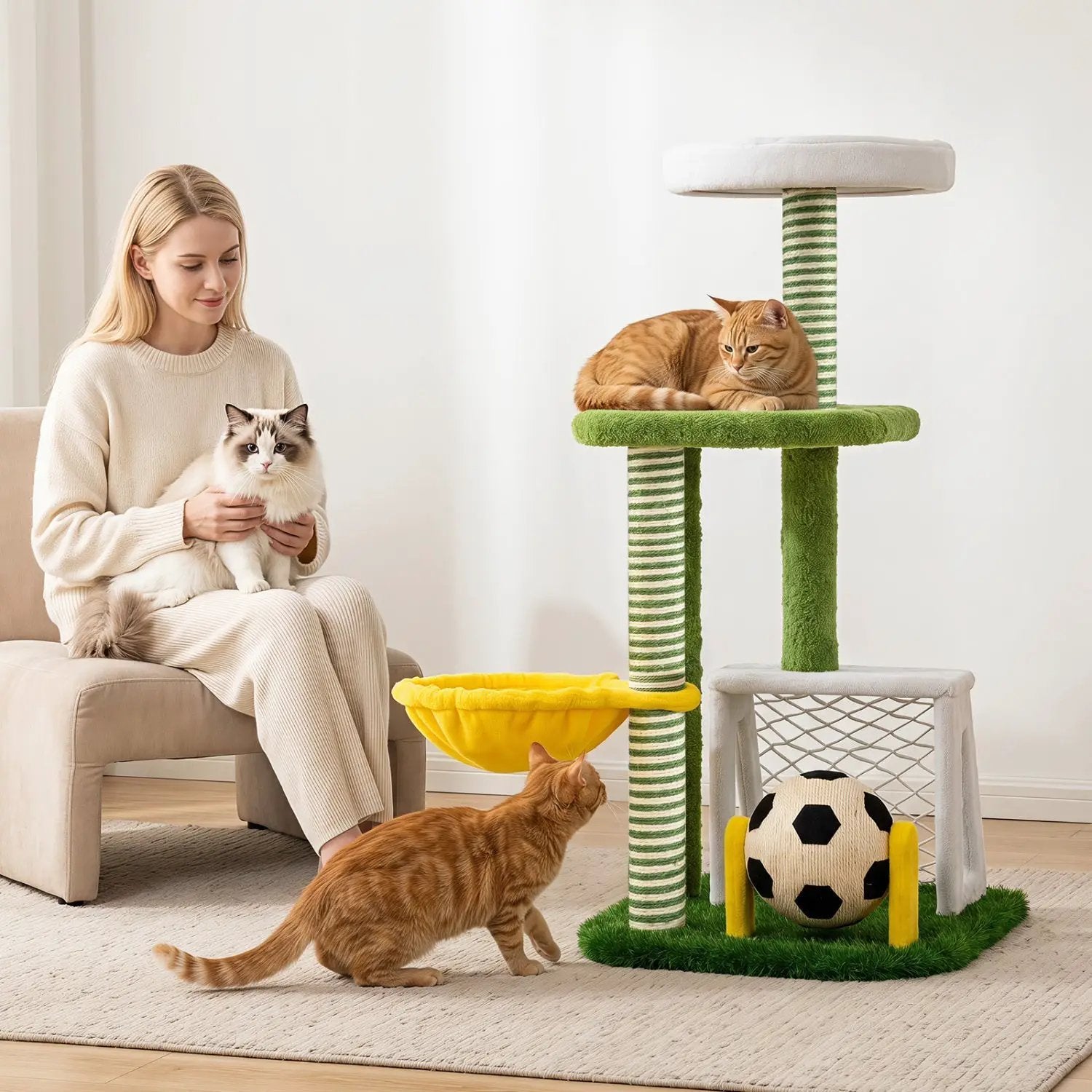DirectDeals multi-level cat tree with soccer-field themed platforms and hammock; green posts, white top, 3 cats in the scene