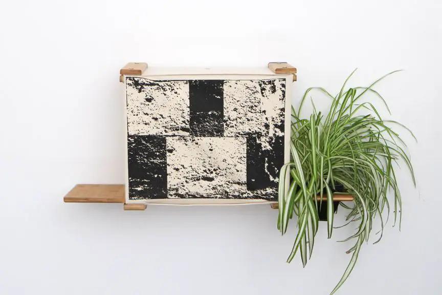 Deluxe Cat Cubby Bed by Catastrophic Creations; wall cubby with black-and-white textured front, light wood shelves