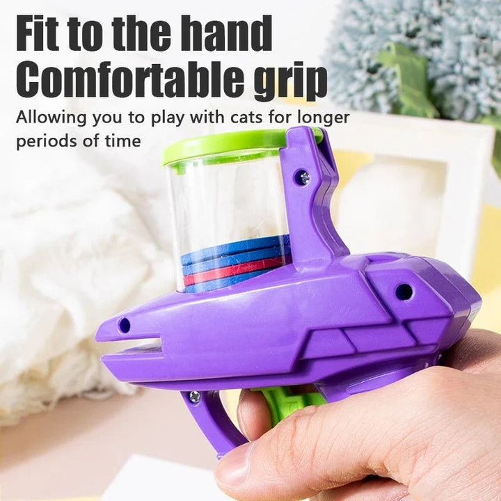 Hand holding purple disc launcher