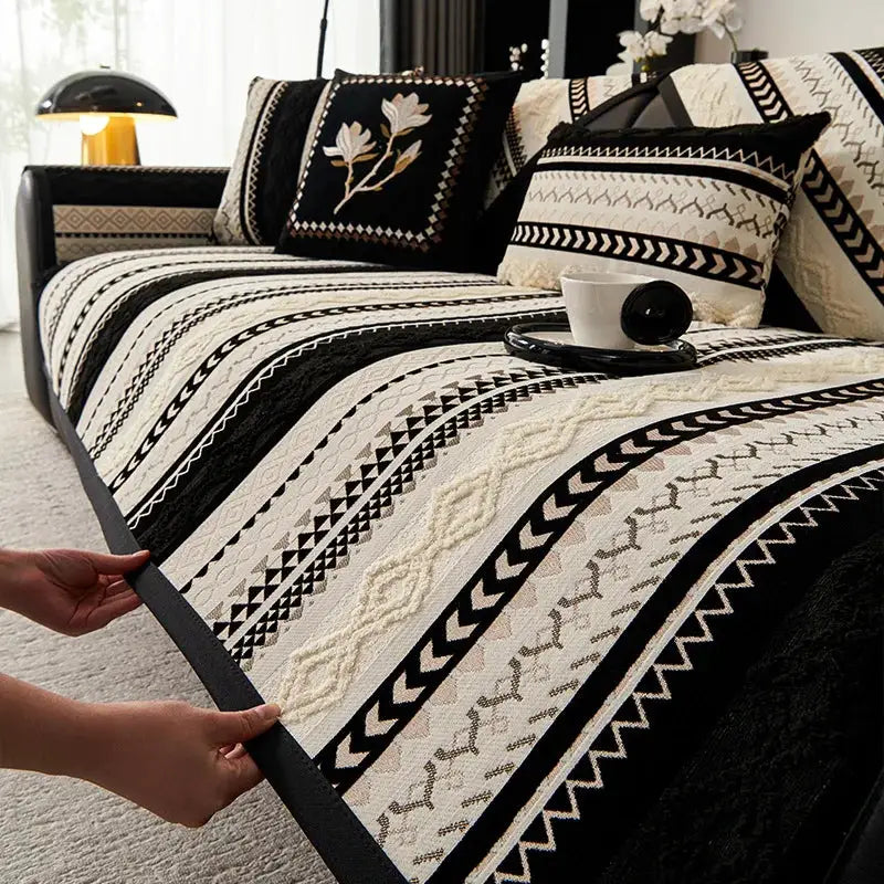 Topspet black couch cover with white geometric quilt pattern; non-slip furniture protector for sofas and pets