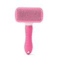 Load image into Gallery viewer, Pink deshedding grooming brush for dogs and cats with a textured handle and wide bristle head
