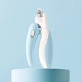 Load image into Gallery viewer, Professional pet nail clippers with LED light, blue handheld trimmer for dogs and cats.
