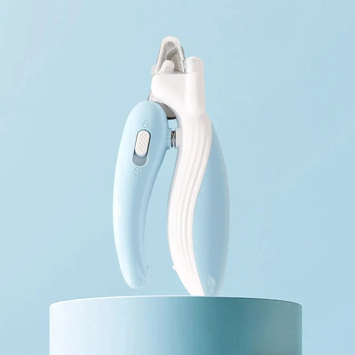 Professional pet nail clippers with LED light, blue handheld trimmer for dogs and cats.