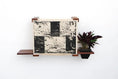 Carica l'immagine nel visualizzatore della galleria, Deluxe Cat Cubby Bed Catastrophic Creations cat condo on a wooden shelf with a black-and-cream patterned cover
