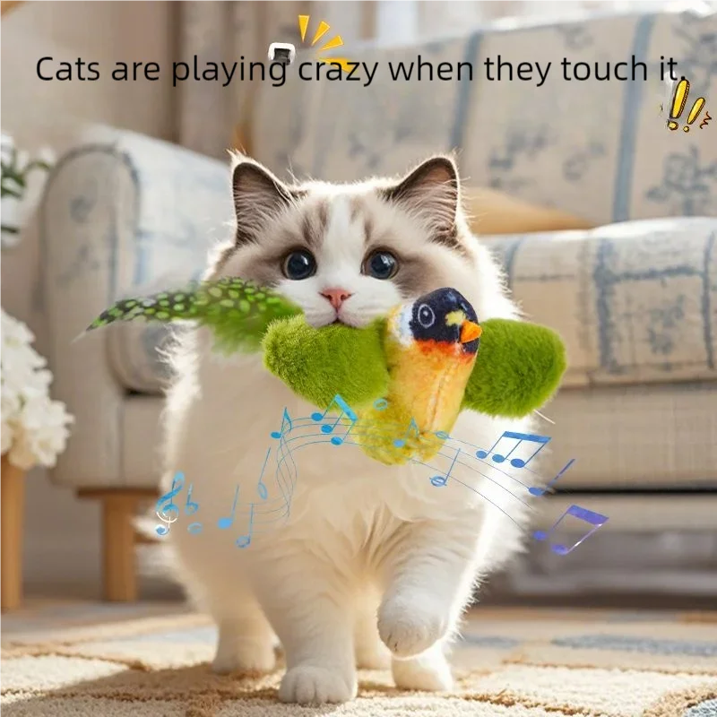 Cat batting a green plush bird