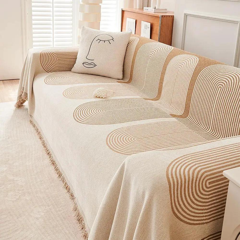 Double-Sided Chenille Couch Slipcover by topspet in beige with tan spiral patterns on a sofa