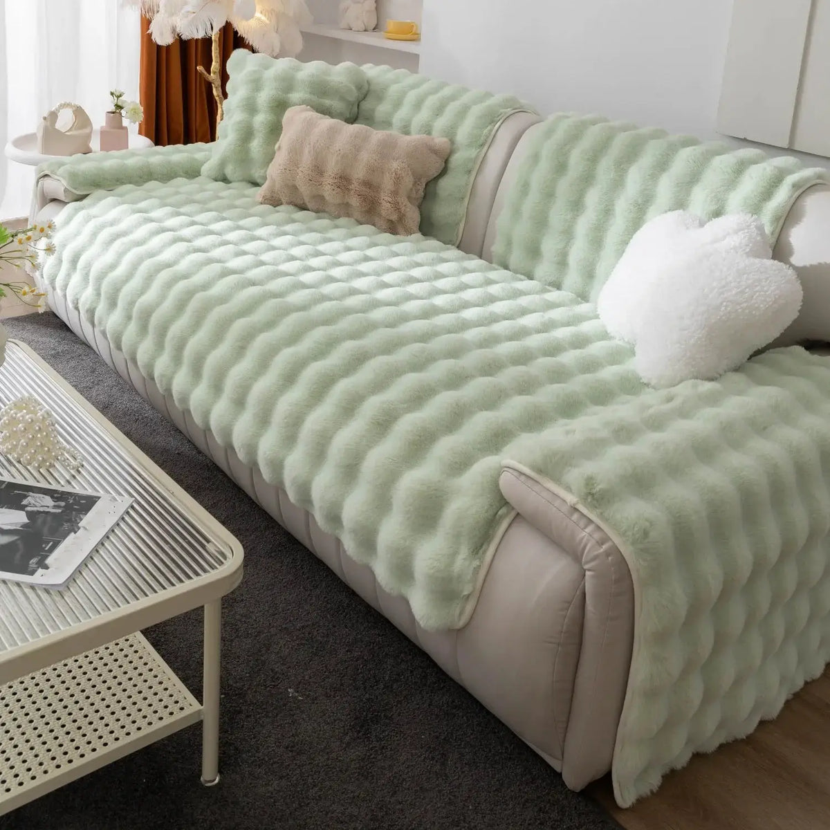 Velvet Couch Cover by topspet in mint green plush on a light sofa with beige pillow