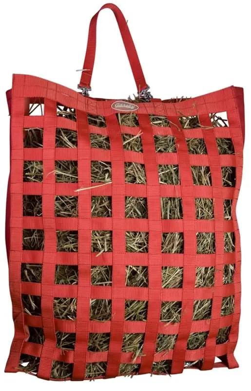 Gatsby All Natural Slow Hay Feeder hay bag by StateLineTack, red woven lattice with sturdy handles.