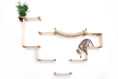 Charger l'image dans la visionneuse de la galerie, The Temple cat condo on wall by Catastrophic Creations; natural wood wall-mounted cat tree with rope bridge.
