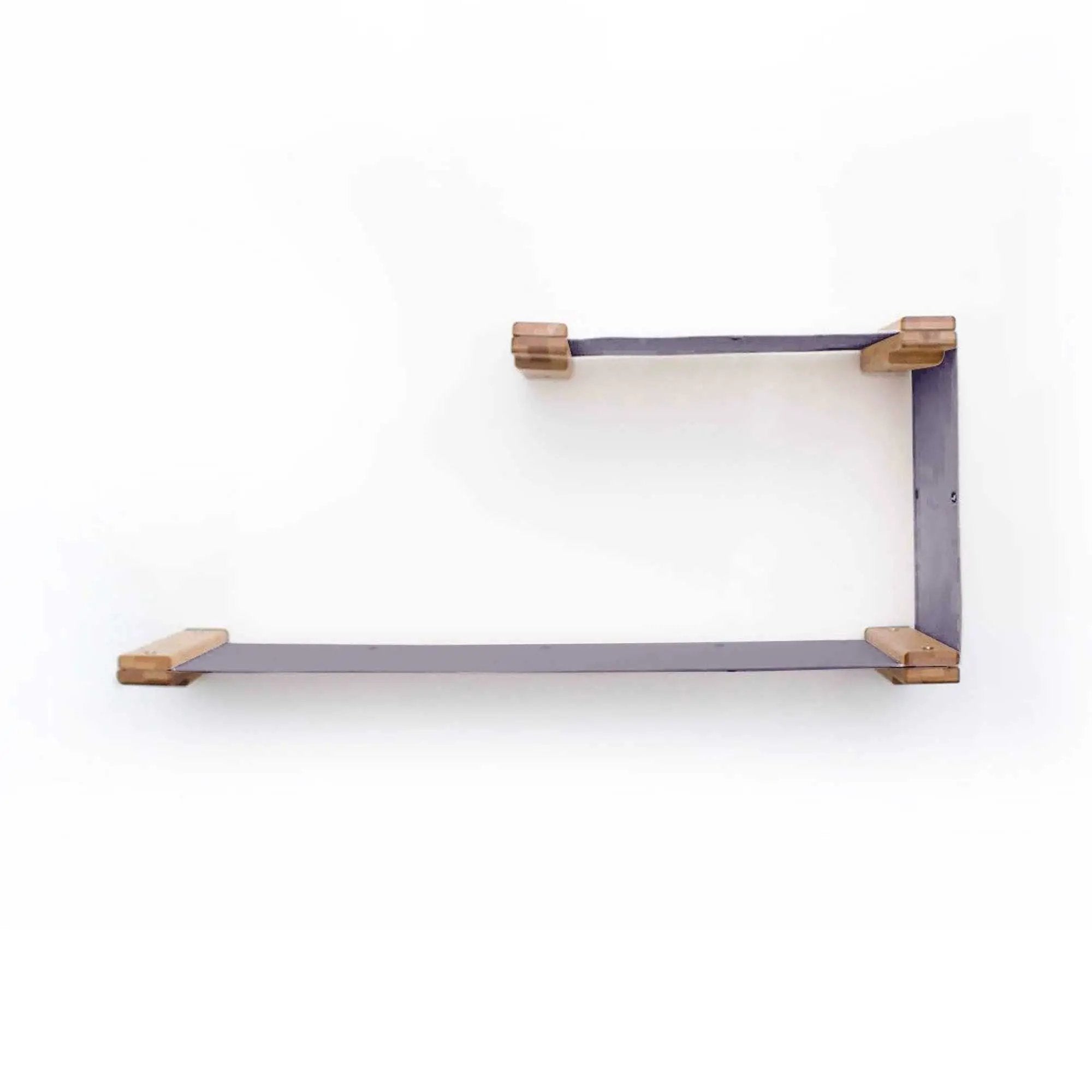 The Double Decker cat hammock mounted on a wall with purple fabric and wooden end caps