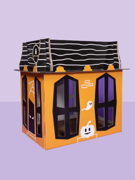 Spooky Cat Haunted House cardboard cat condo, orange with black window panels and ghost decals.