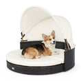 Bild in Galerie-Betrachter laden, DirectDeals Wicker Dog House with retractable white canopy and cushioned round seat, dog resting.
