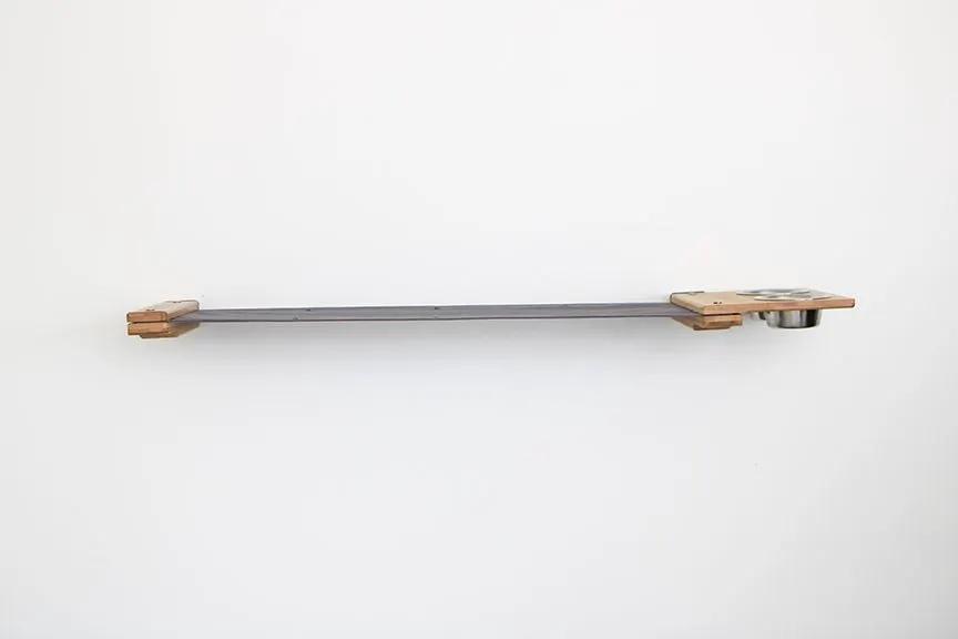 Cat Hammock by Catastrophic Creations, wall-mounted raised cat furniture with wooden ends and metal bar.