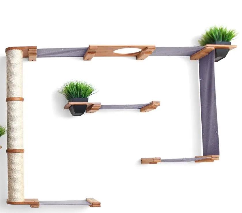 Cat Condo The Gardens by Catastrophic Creations with purple fabric, wooden platforms, and greenery