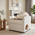 Load image into Gallery viewer, Beige fabric accent chair with hidden pet nook, cat nearby in a cozy living room.
