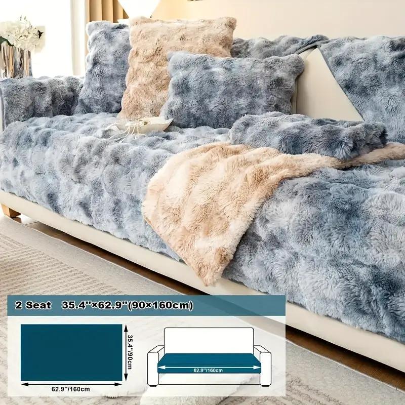 Luxurious Gradient Velvet Sofa Cover by topspet on a blue-gray sofa with a beige throw blanket